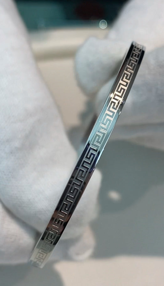 Bracciale rigido acciaio lucido con greca diametro cm 6 apribile