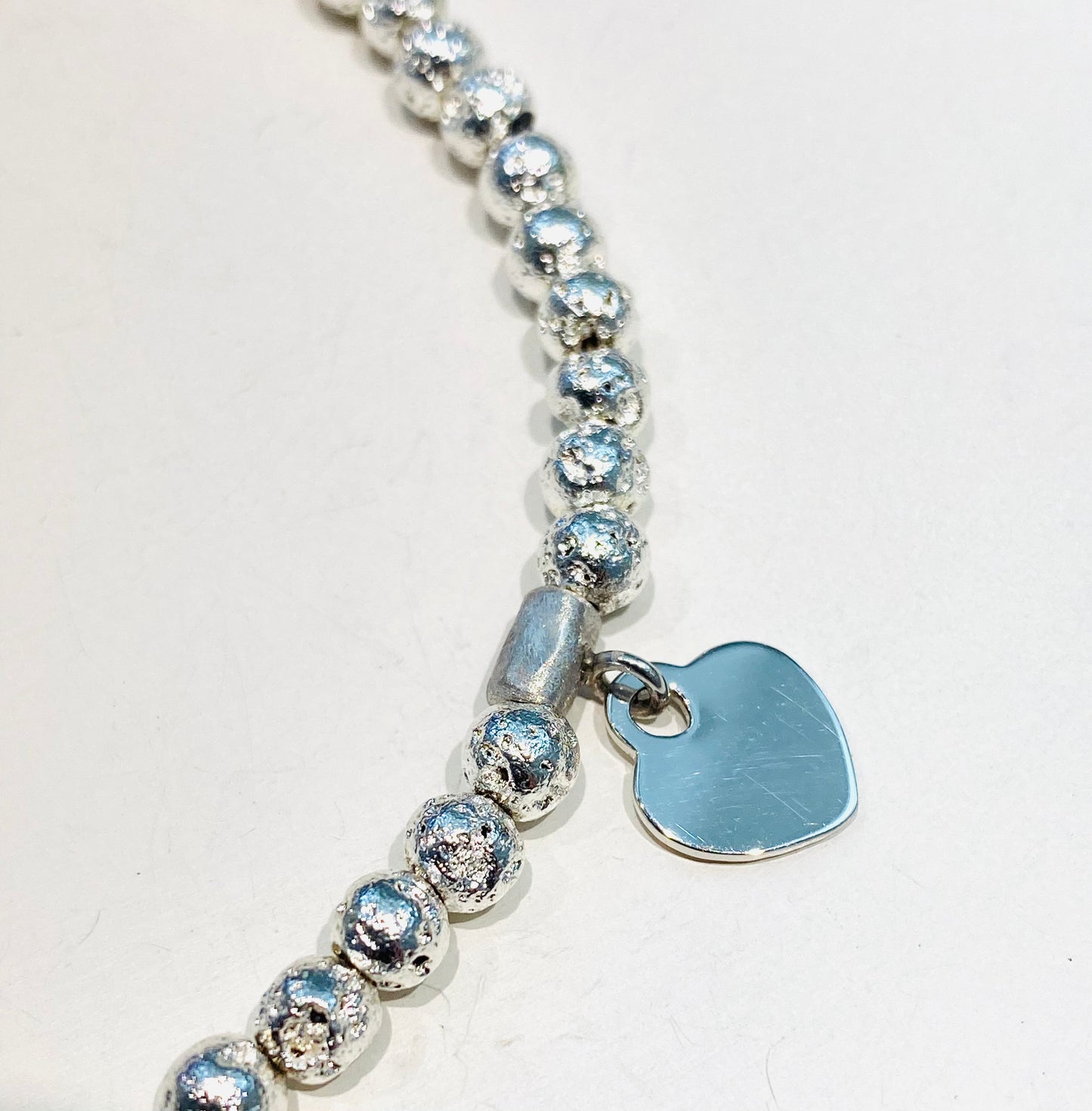 Collarino choker pietra lavica placcato argento mm 4 pendente cuore argento rodio bianco