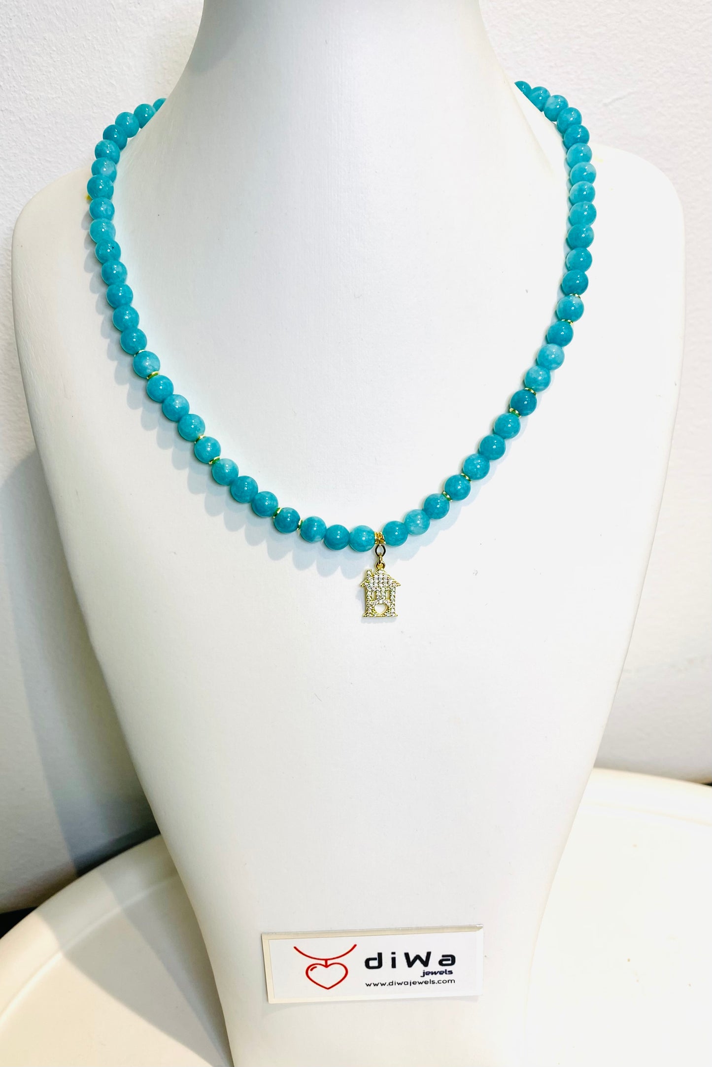 Collana in argento sterling e giada turchese liscia tonda pendente “home”