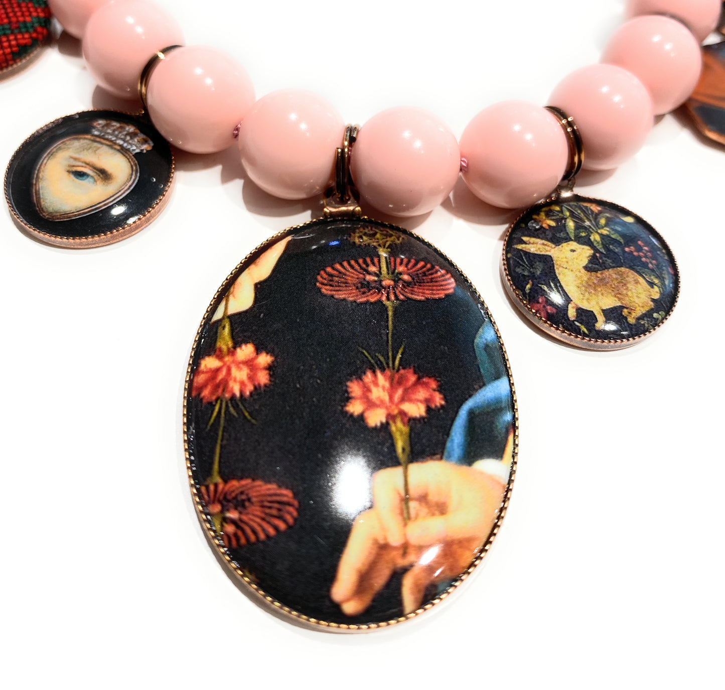 Collana con charms vintage e conchiglia rosa in argento sterling