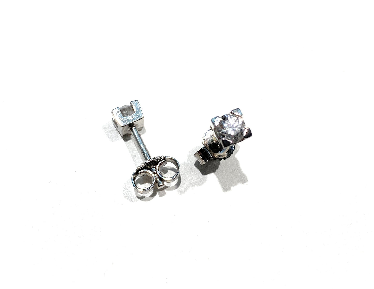 Orecchini punto luce oro 18 kt e diamanti