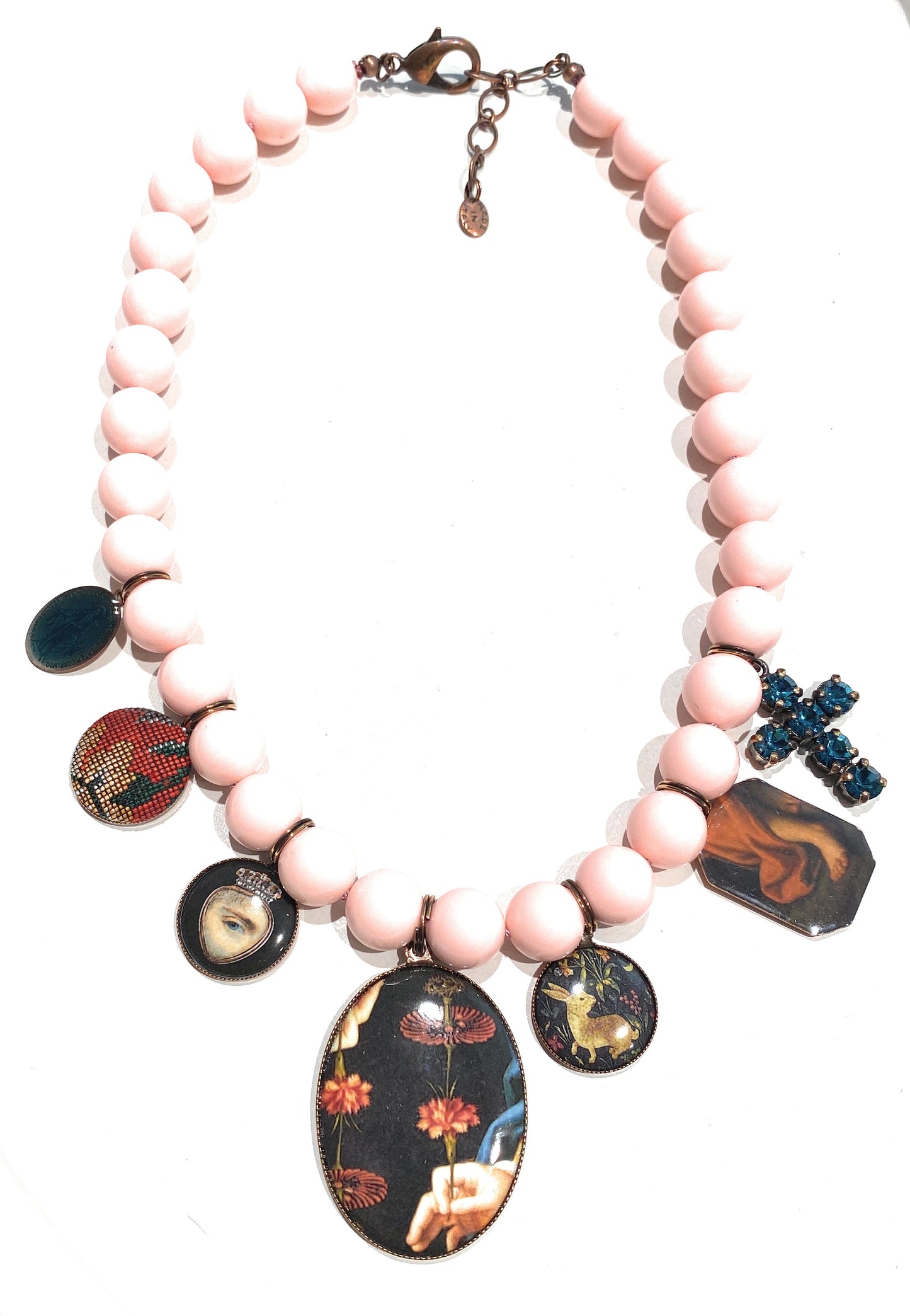 Collana con charms vintage e conchiglia rosa in argento sterling