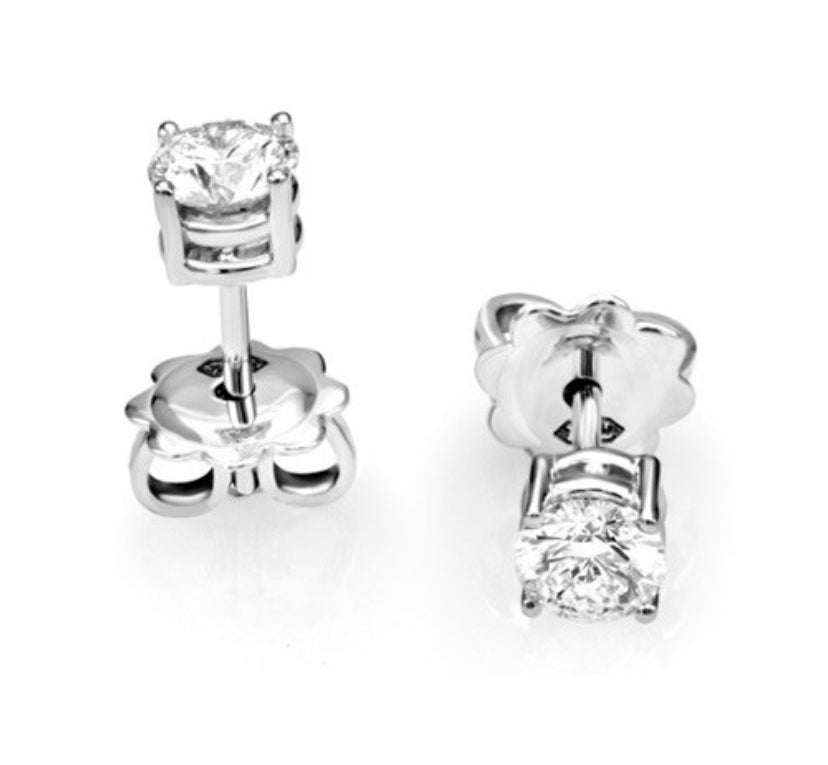 Orecchini punto luce "classic" in oro 18 kt e diamanti