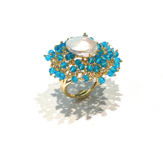 Anello cocktail pietre sfaccettature rosa centrale perla barocca fresh water