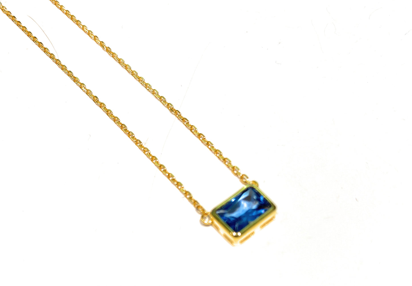 Collarino argento 925 galvanica gialla centrale zircone carré tipo zaffiro blu