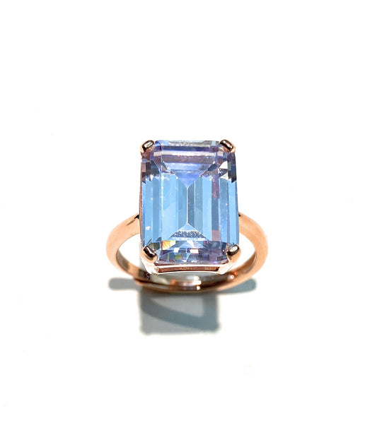 Anello tipo solitario zircone baguette azzurro chiaro argento sterling rosé 4 griffes