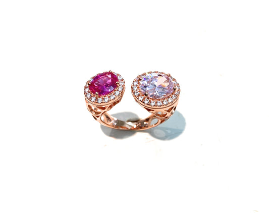 Anello contrarie pietre fucsia e rosa lavorazione traforata argento sterling rosé